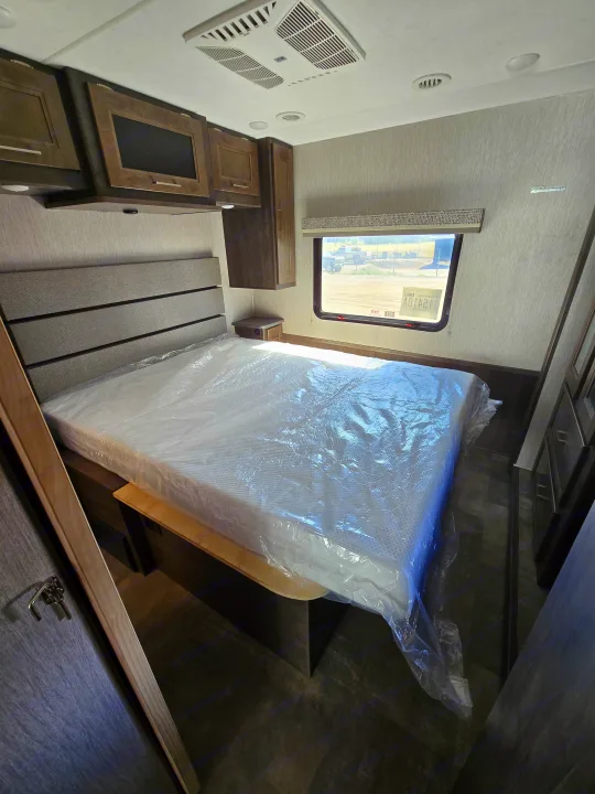 Private rear bedroom in the Coachmen Pursuit