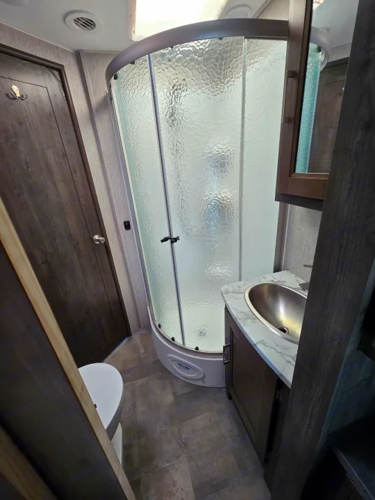 Interior shower in the Coachmen Pursuit
